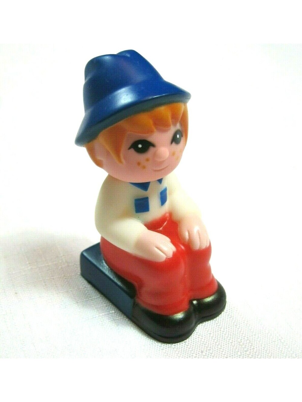 Vintage Taiwan Rubber Squeeze Toy 3" Freckled Boy Sitting Figure with Blue Hat